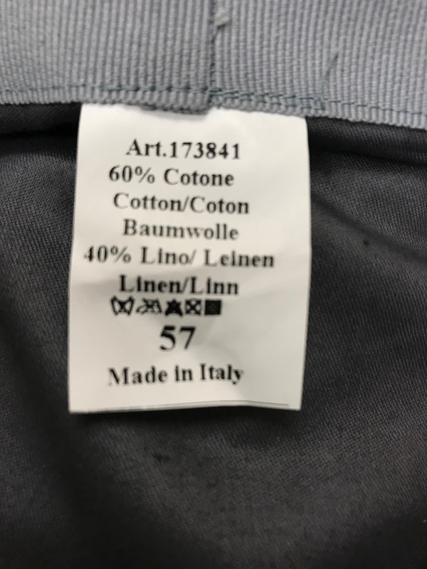 Größenetikett der Mütze mit Materialangabe (60 % Baumwolle, 40 % Leinen) und Größe 57
