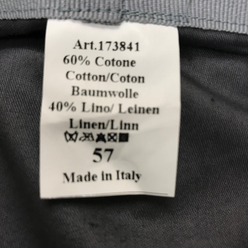 Größenetikett der Mütze mit Materialangabe (60 % Baumwolle, 40 % Leinen) und Größe 57