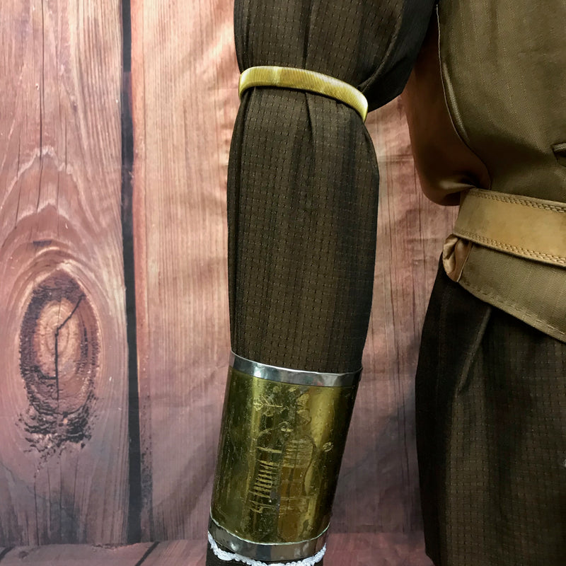 Armmanschette und Ärmelhalter in gold
