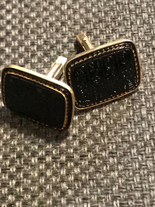 „Vintage Manschettenknöpfe in Gold mit schwarzem Stein“