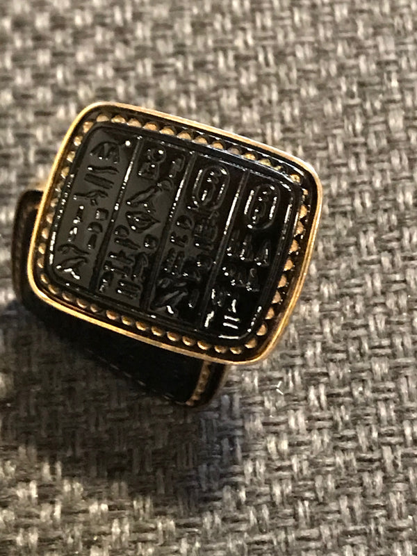 „Elegante goldfarbene Manschettenknöpfe mit schwarzem Glasstein“