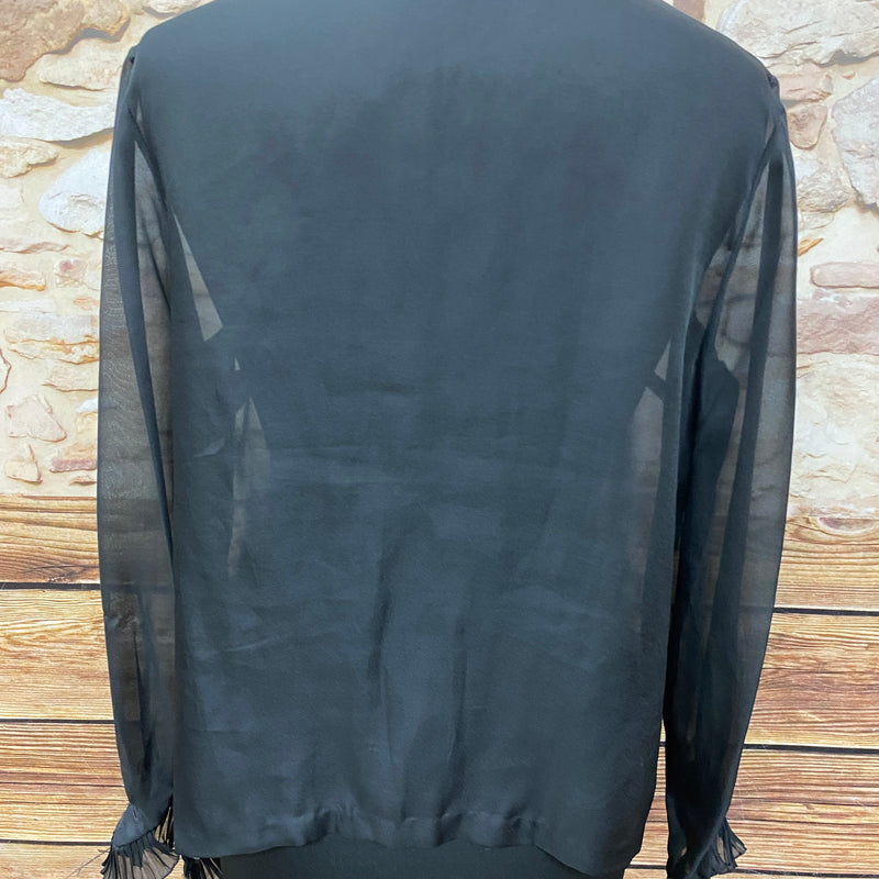 Schwarze transparente Vintage-Rüschenbluse aus den 1970er Jahren, Rückenansicht