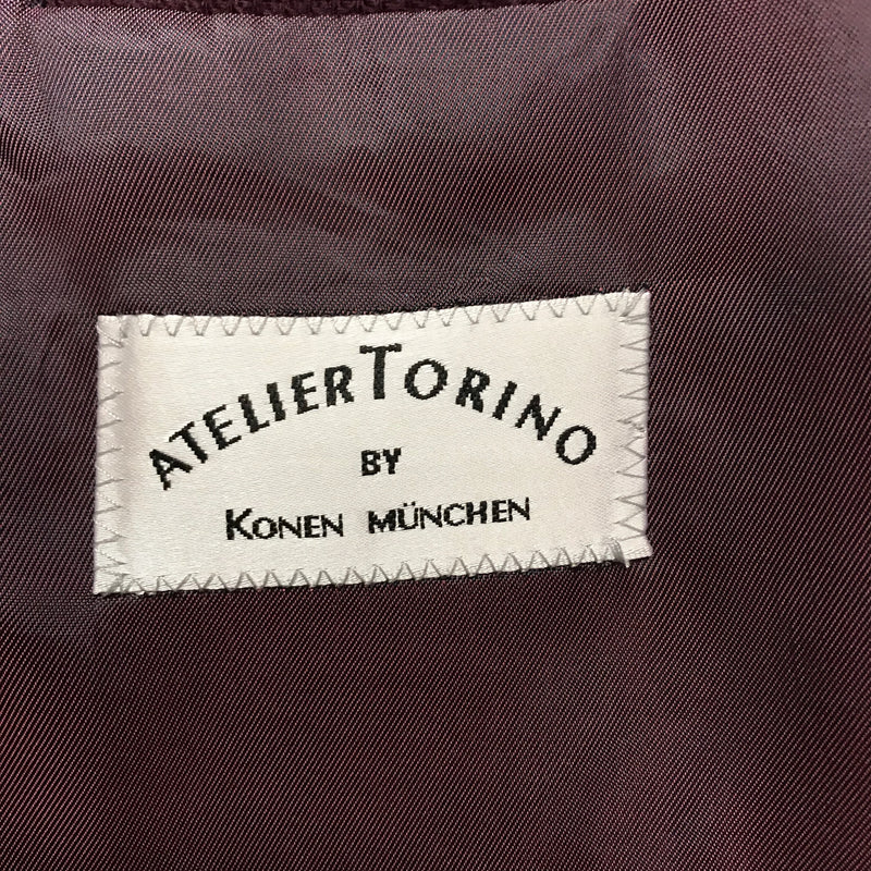 Innenetikett „Atelier Torino by Konen München“.