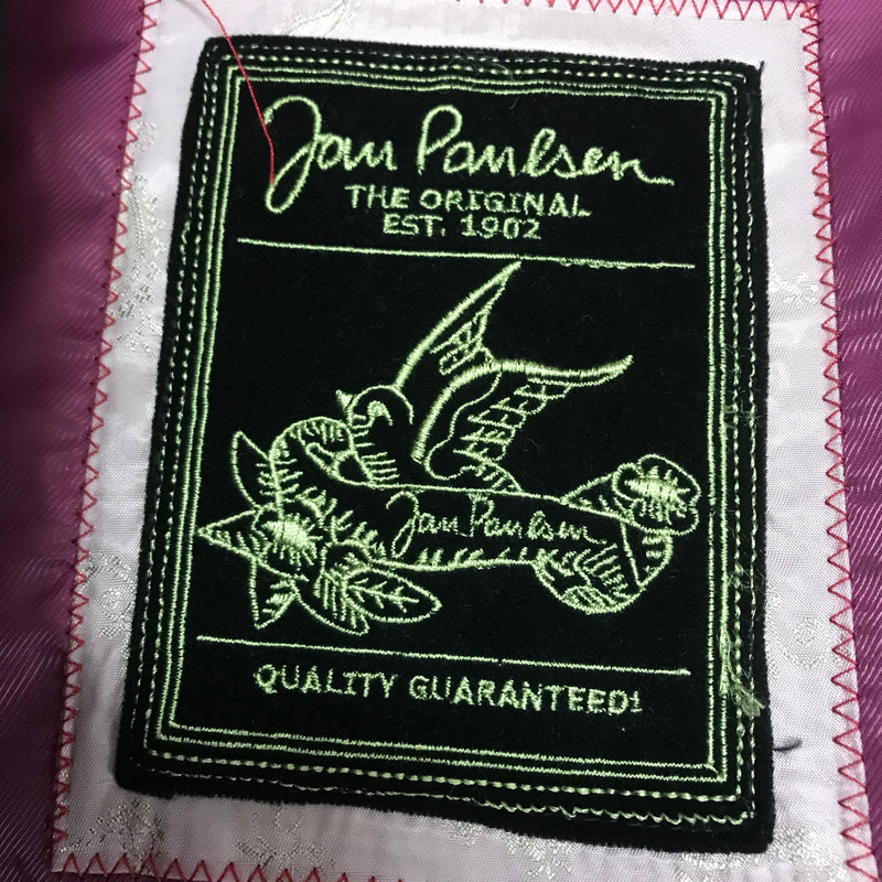 Innenetikett „Jan Paulsen The Original“ auf pinkfarbenem Futter