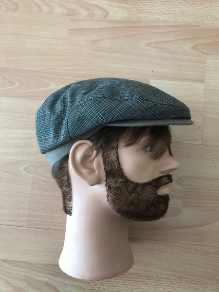 Graue Vintage Schiebermütze Wegener im 20er-Jahre-Stil, Seitenansicht auf Schaufensterkopf