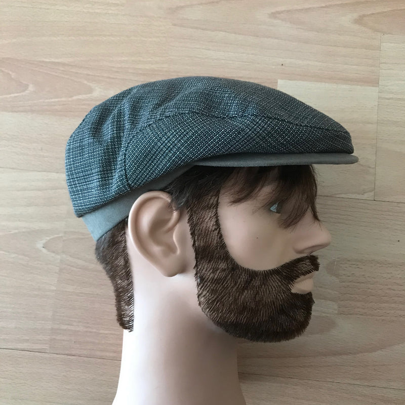 Graue Vintage Schiebermütze Wegener im 20er-Jahre-Stil, Seitenansicht auf Schaufensterkopf
