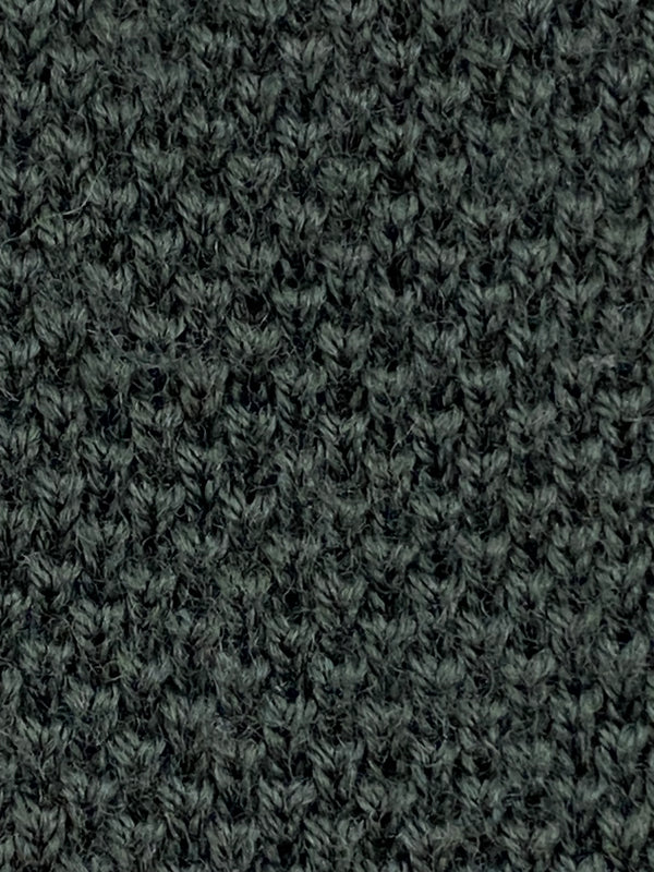 Detailaufnahme der grünen Vintage Strickkrawatte mit Strickmuster