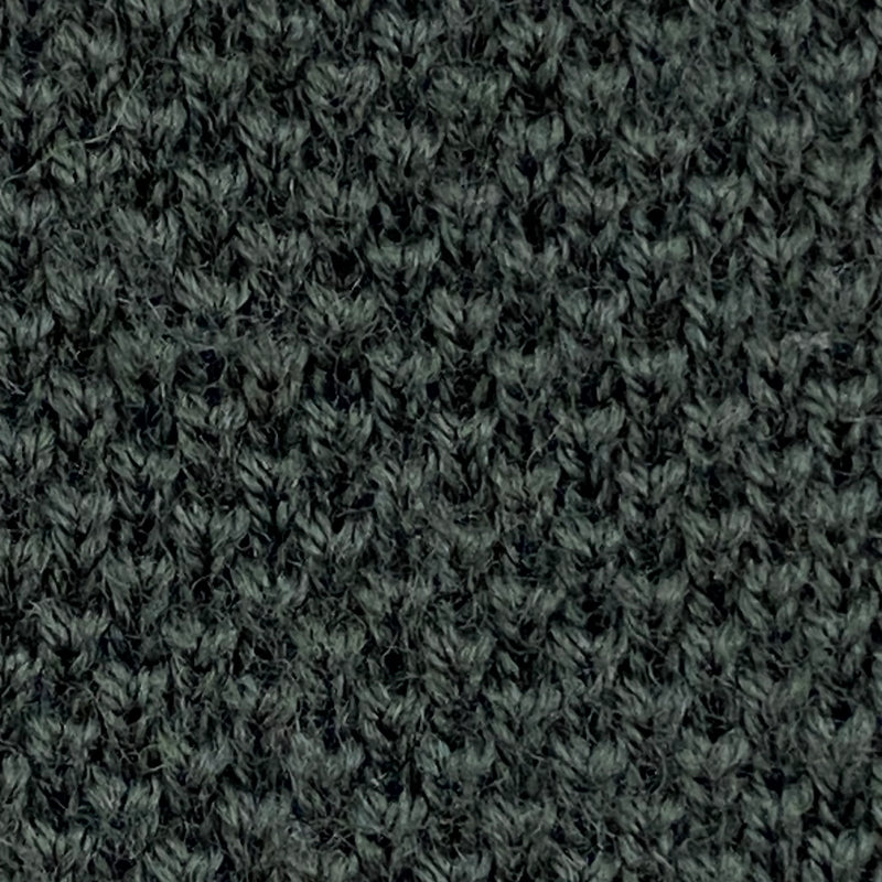 Detailaufnahme der grünen Vintage Strickkrawatte mit Strickmuster