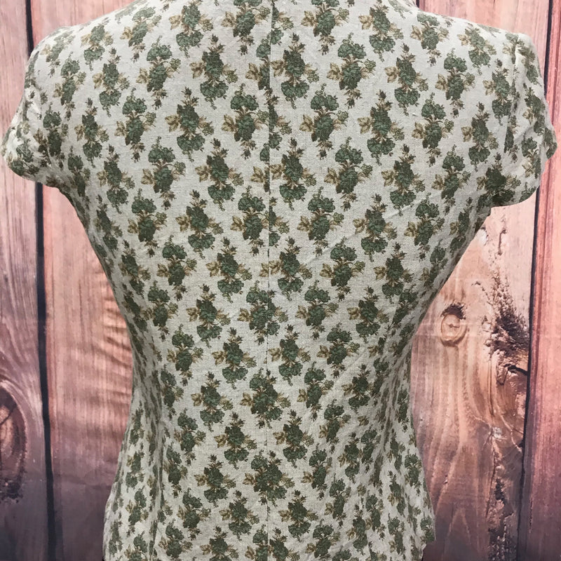Vintage-Bluse Größe 38 mit Blümchenprint, Rückenansicht, taillierte Passform.